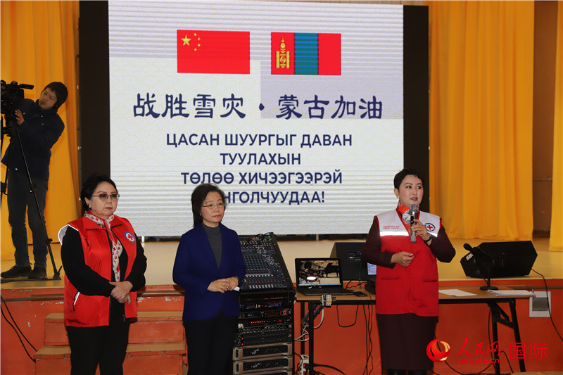 3月18日，巴特策策格（右）外長(zhǎng)致辭。人民網(wǎng)記者 霍文攝